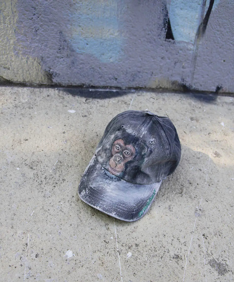 The Chimpanzee Awareness Cap - Rebelle Theory